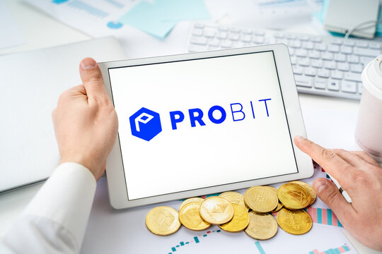 Russia Moscow 06.05.2021.Businessman with tablet.Logo of cryptocurrency stock exchange Probit.Trading blockchain platform to buy,sell digital crypto coins,tokens Bitcoin,Ethereum.Business,investing