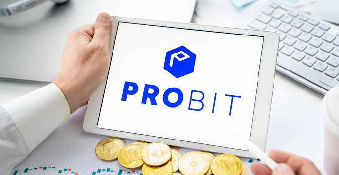 Russia Moscow 06.05.2021.Businessman with tablet.Logo of cryptocurrency stock exchange Probit.Trading blockchain platform to buy,sell digital crypto coins,tokens Bitcoin,Ethereum.Business,investing