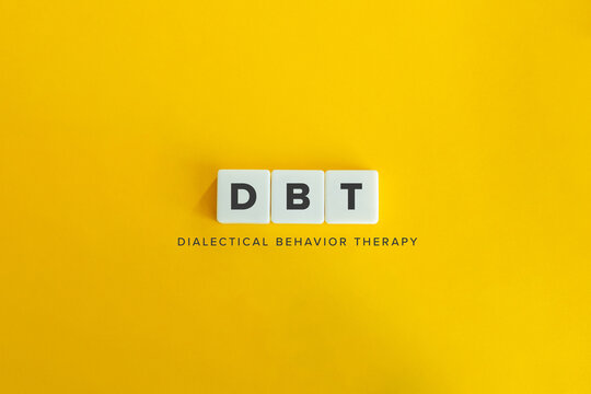 Dialectical Behavior Therapy (DBT) Banner And Concept. Block Letters On Bright Orange Background. Minimal Aesthetics.