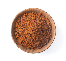 brown sugar in the wooden bowl, isolated on white background, top view