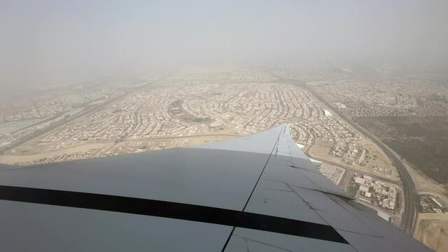 View from the window airplane taking off at Dubai international Airport