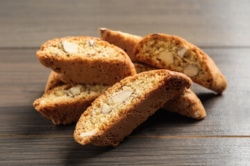 Traditional Italian almond biscuits (Cantucci) on wooden table
