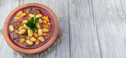 Delicious tomato sauce bean casserole.