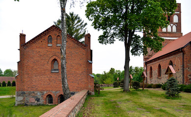 General view and close-ups of architectural details of the funeral chapel at the Catholic Church of the Assumption of the Blessed Virgin Mary, in the town of Galiny, warmi, Poland.