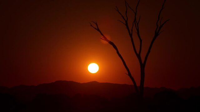 Time Lapse of the Sun rising over the Namibian desert.