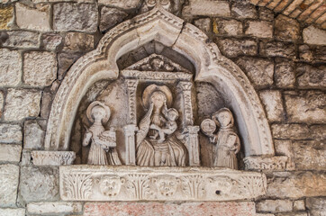 Bas-relief of the Virgin Mary at the entrance to the old town of Kotor.