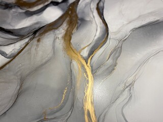Abstract grey art with gold — black and whited background with beautiful smudges and stains made...