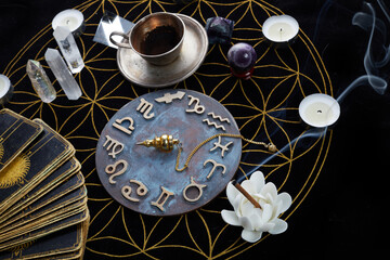 Fortune Telling Table with tarot cards and esoteric objects