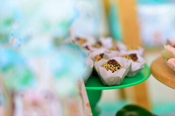 chocolate chip cookie brigadeiro with peanuts, condensed milk candy balls, candy balls, sweets table