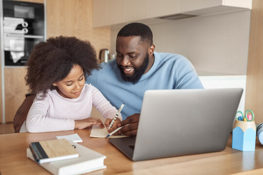 Caring Happy Father Help Cheerful Little Daughter With School Subject Homework