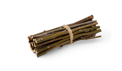 Thin dry birch branches and sticks for lighting a fire are tied with a jute rope in a tight bundle and isolated on a clean white background with a soft shadow.