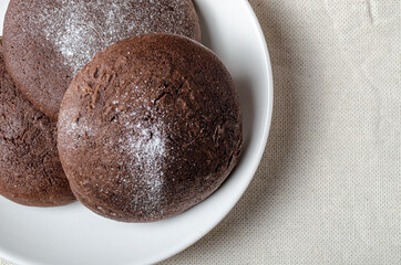 Chocolate biscuits with powdered sugar. High quality photo