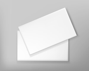 Two realistic blank plastic credit cards in the air on white background with shadow. Vector illustration.