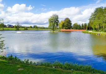 Landscape with lake and trees of Messany lake in Belgium