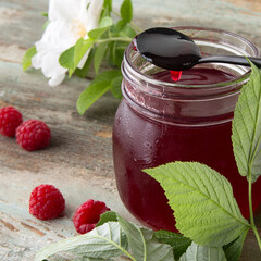 jar of homemade raspberry jam close-up