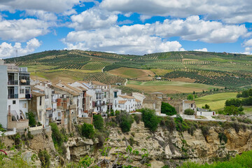 Obraz premium View of the town Alhama de Granada (Spain) hanging over a steep and deep gorge. Its old town is declared a Historic-Artistic Site.
