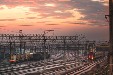 railway in the city at sunset