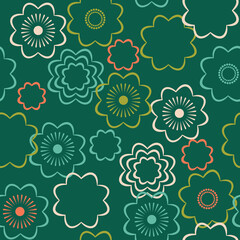 Floral vector seamless pattern. Simple multicolored flowers on a green background.