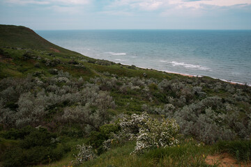 Seascape. Blue sea and clean coast. Travel and outdoor recreation.