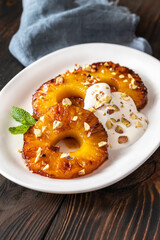 Roasted pineapple with pistachios