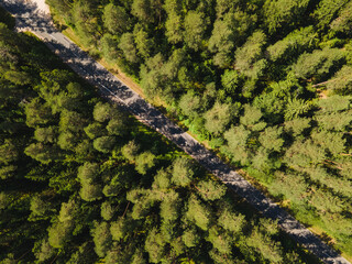 Summer forest road aerial view, rural Lithuania