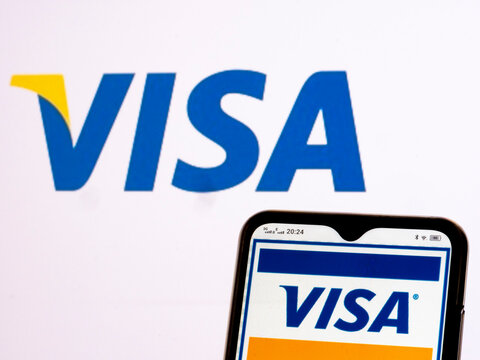  In this photo illustration Visa Inc. logo seen displayed on a smartphone