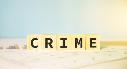 CRIME word written on wood block. financial fraud concept.