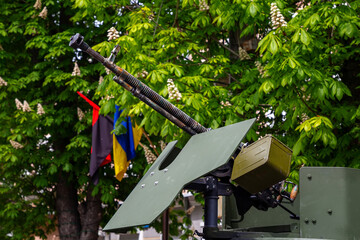 Machine gun shooting bursts in war