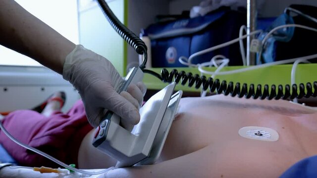 Defibrillator. Dropper. Ambulance equipment. Human salvation. Providing medical care. Human treatment. 