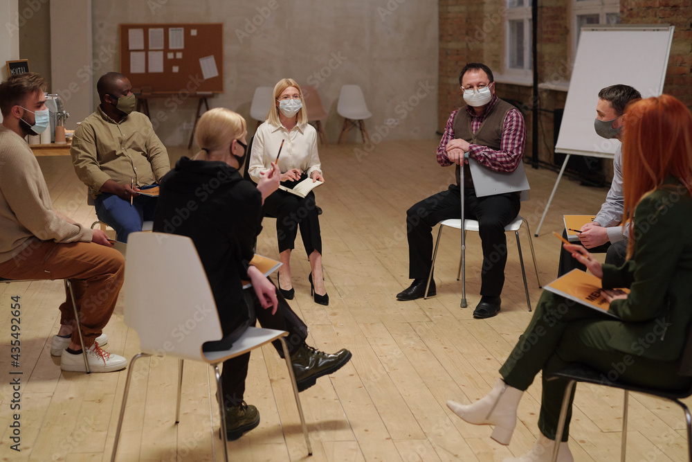 Poster Group of people in trouble interacting with one another and counselor during session