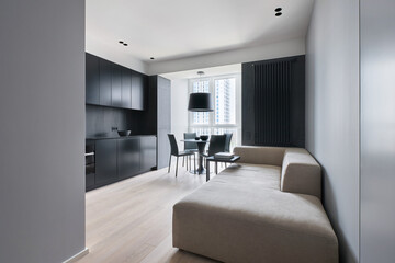 Black kitchen in a monochrome studio