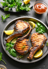 Grilled pork steaks