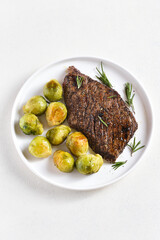 Grilled beef steak with brussels sprouts