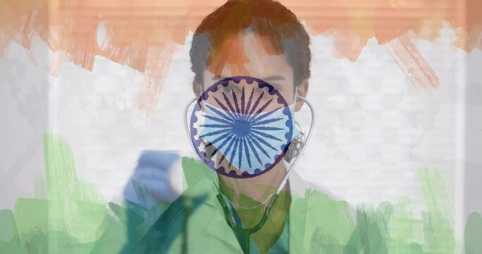 Composition of covid 19 cells and female doctor with face mask and stethoscope over indian flag