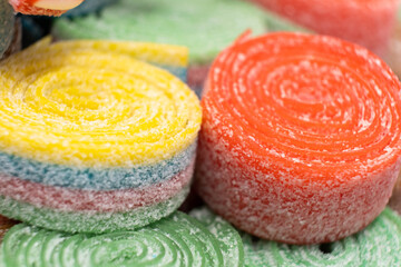 Colorful sweet jelly and candies with sugar. Macro.