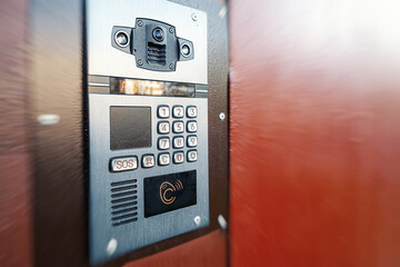 Digital intercom with the ability to record incoming calls to the house. Buttons for entering the...