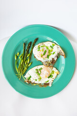 Very tasty and healthy breakfast - scrambled eggs, asparagus. It's a lovely morning.
