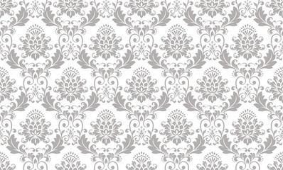 Floral pattern. Vintage wallpaper in the Baroque style. Seamless vector background. White and gray ornament for fabric, wallpaper, packaging. Ornate Damask flower ornament.
