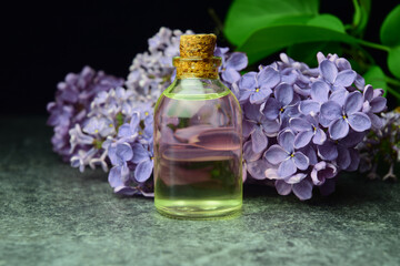 Obraz na płótnie Canvas Lilac aroma oil organic spa
