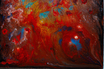 Obraz na płótnie Canvas Texture in the style of fluid art. Abstract background with swirling paint effect. Liquid acrylic paint background. Blue, red colors.
