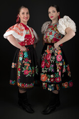 Young beautiful slovak woman in traditional dress. Slovak folklore