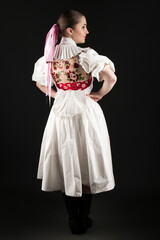 Young beautiful woman in traditional dress. Slovak folklore