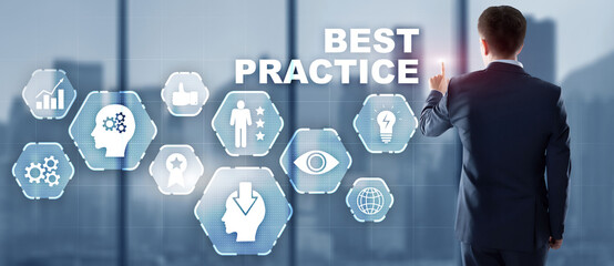 Businessman pressing best practice button on virtual screens