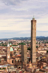 Two famous falling Bologna towers Asinelli and Garisenda. Evening view, Bologna, Emilia-Romagna, Italy. © xamnex