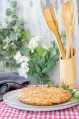 Omelette and whole noodle omelet on a plate. Normal view. Vertical shot. Copy space.