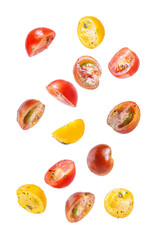 Colorful tomatoes basil pepper salad on a white isolated background