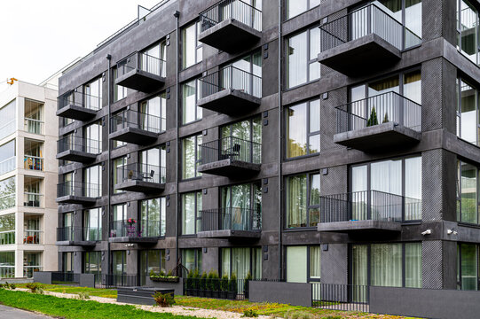 Facade of modern apartment building in black and white