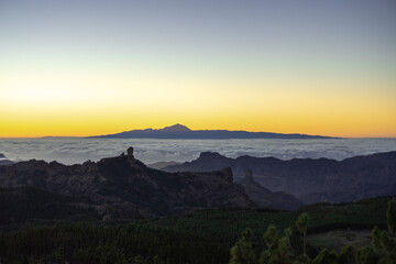 Naklejka na ściany i meble Sunset with the Roque Nublo and the Teide peak from Gran Canaria.