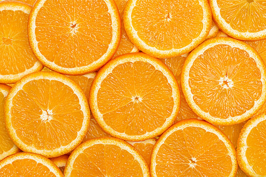 background sliced fresh orange close-up