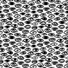 Seamless pattern with eyes and eyelashes. Black and white ink illustration. Free hand drawing bohemian style. Tribal print of open eyes. Ethnic background for web, fabric design, scrapbook elements